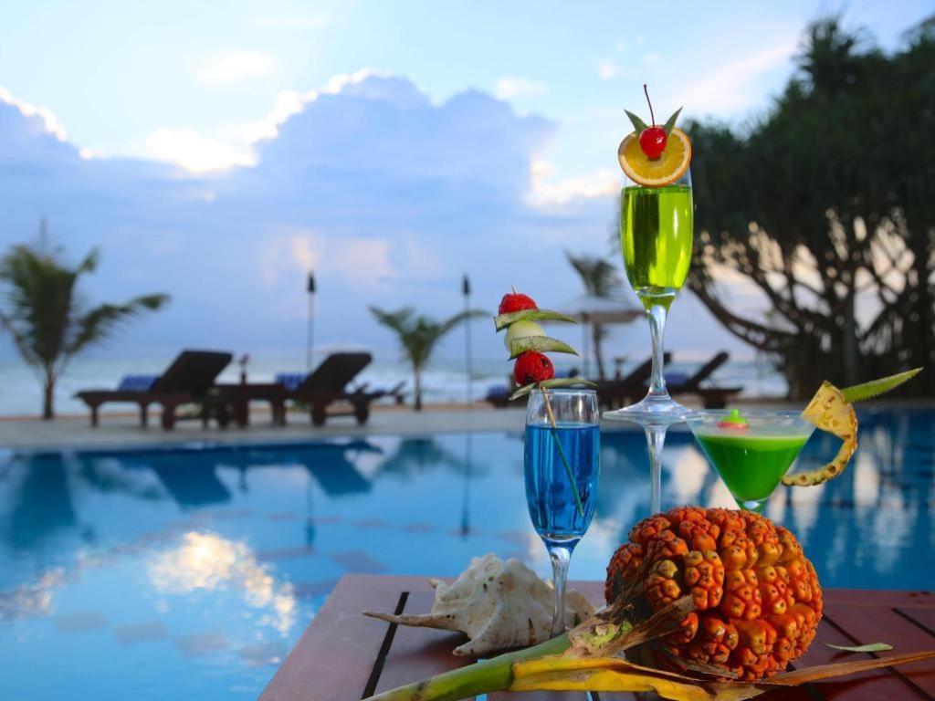 בנטוטה Whispering Palms Hotel מראה חיצוני תמונה