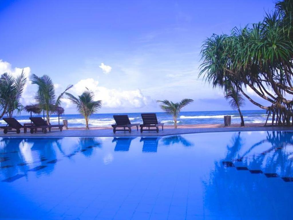 בנטוטה Whispering Palms Hotel מראה חיצוני תמונה