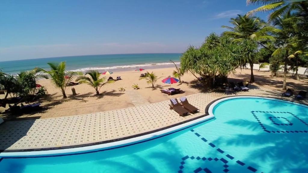 בנטוטה Whispering Palms Hotel מראה חיצוני תמונה