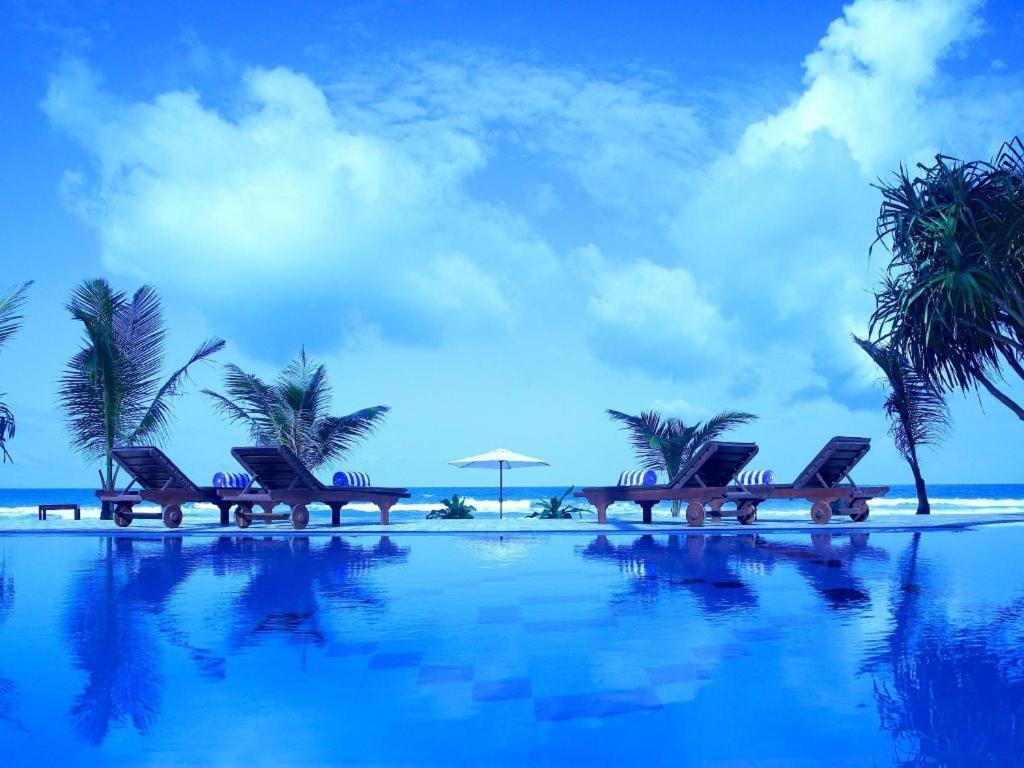בנטוטה Whispering Palms Hotel מראה חיצוני תמונה