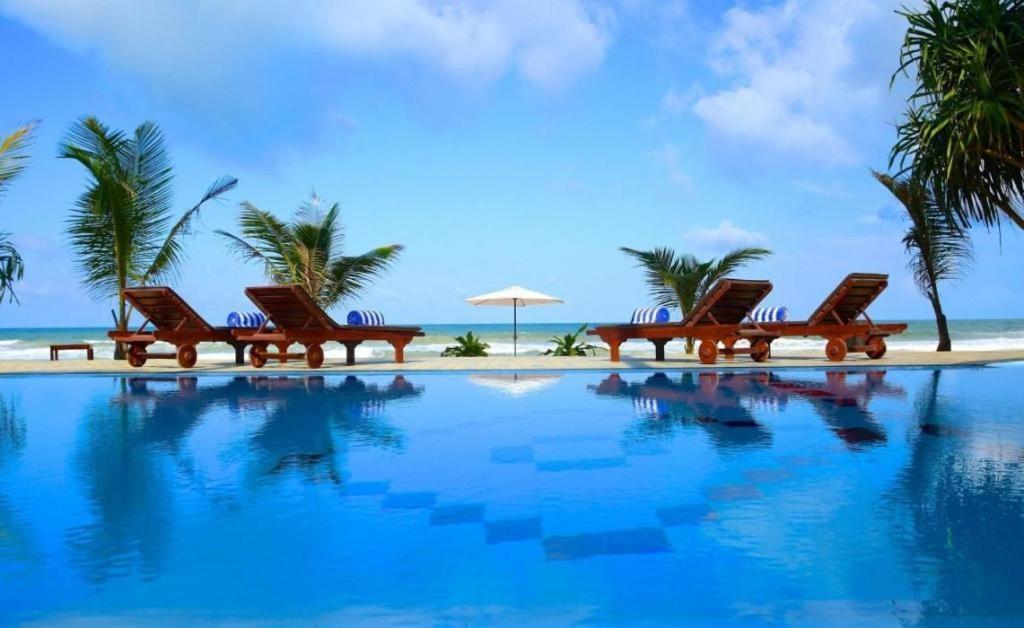 בנטוטה Whispering Palms Hotel מראה חיצוני תמונה
