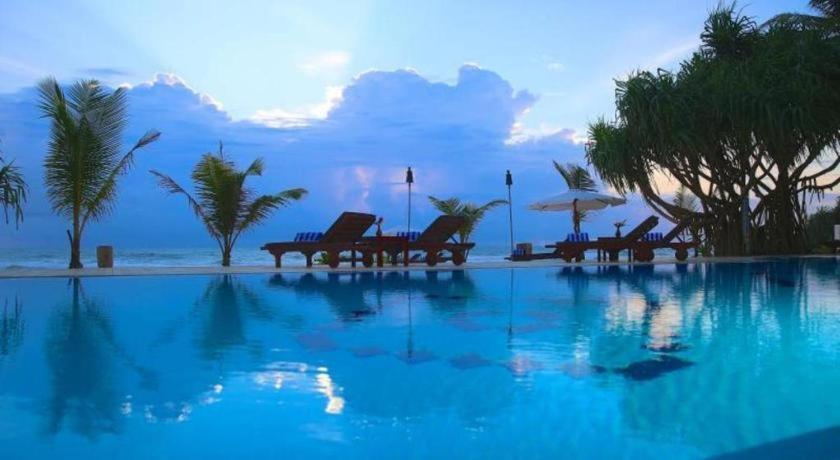 בנטוטה Whispering Palms Hotel מראה חיצוני תמונה
