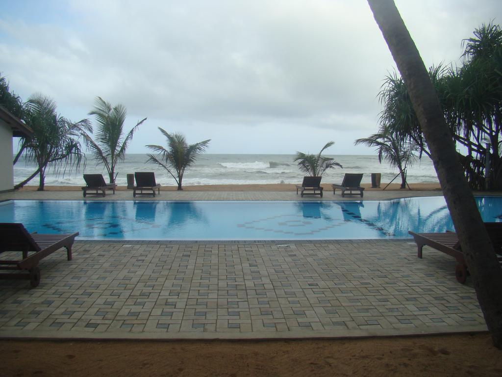 בנטוטה Whispering Palms Hotel מראה חיצוני תמונה