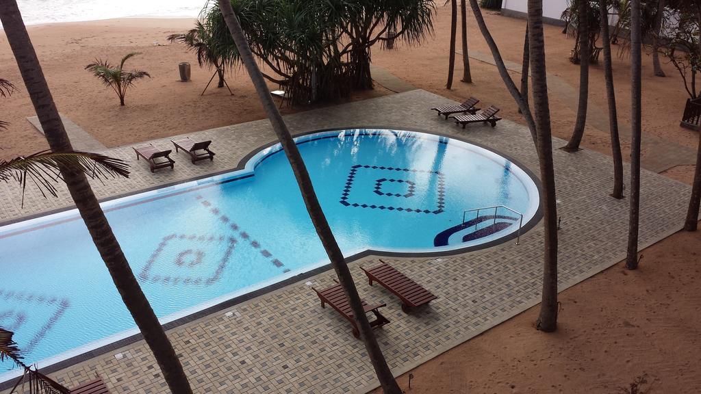 בנטוטה Whispering Palms Hotel מראה חיצוני תמונה